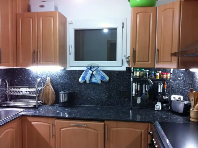 Kitchen with dishwasher and window